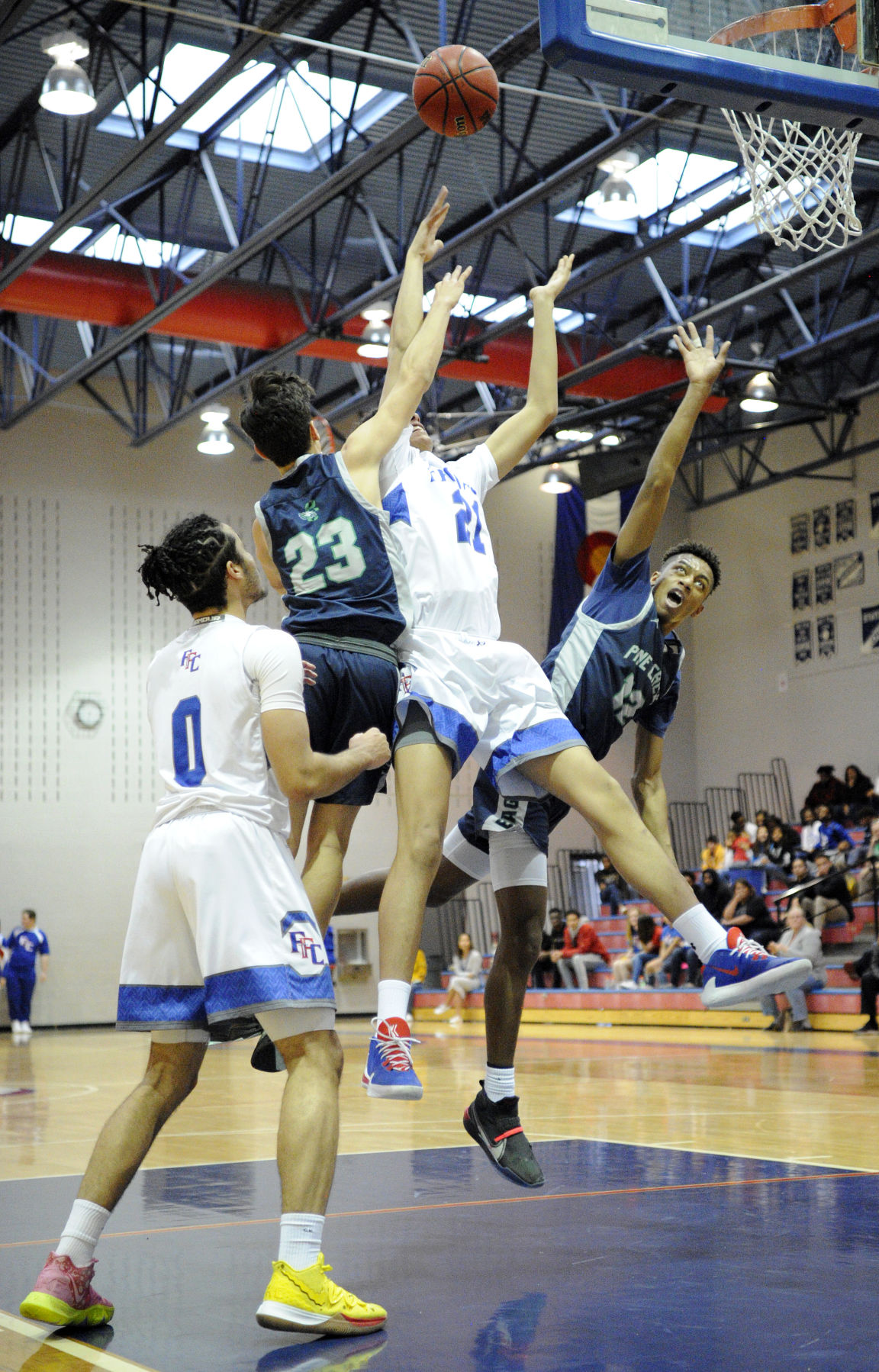 PHOTOS: Fountain-Fort Carson Trojans (58) Pine Creek Eagles (70)